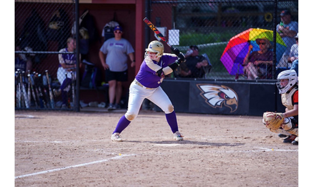 a photo containing Alyssa playing softball