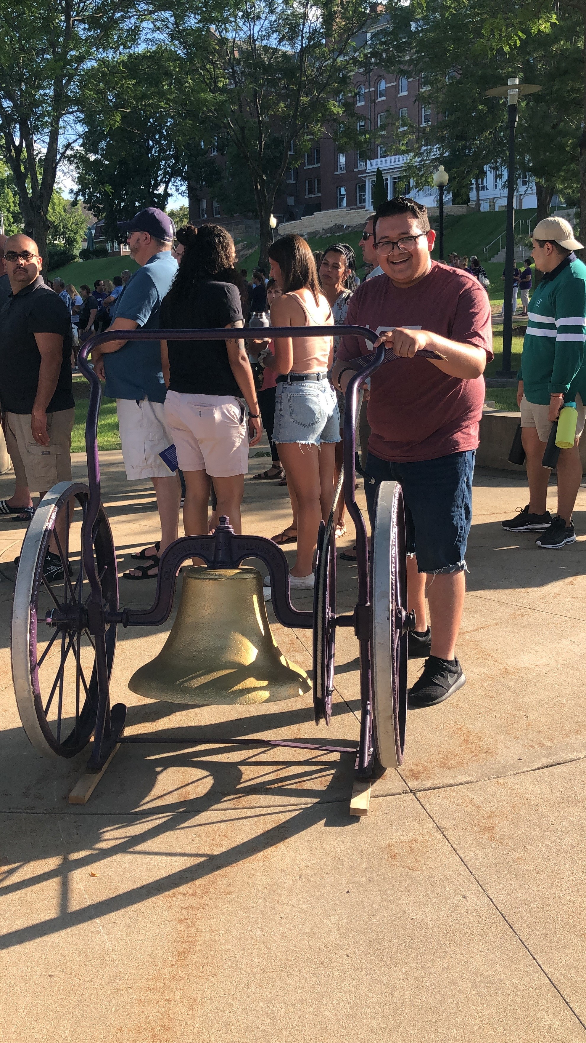 Me ringing the bell to start my semester and year at Loras.