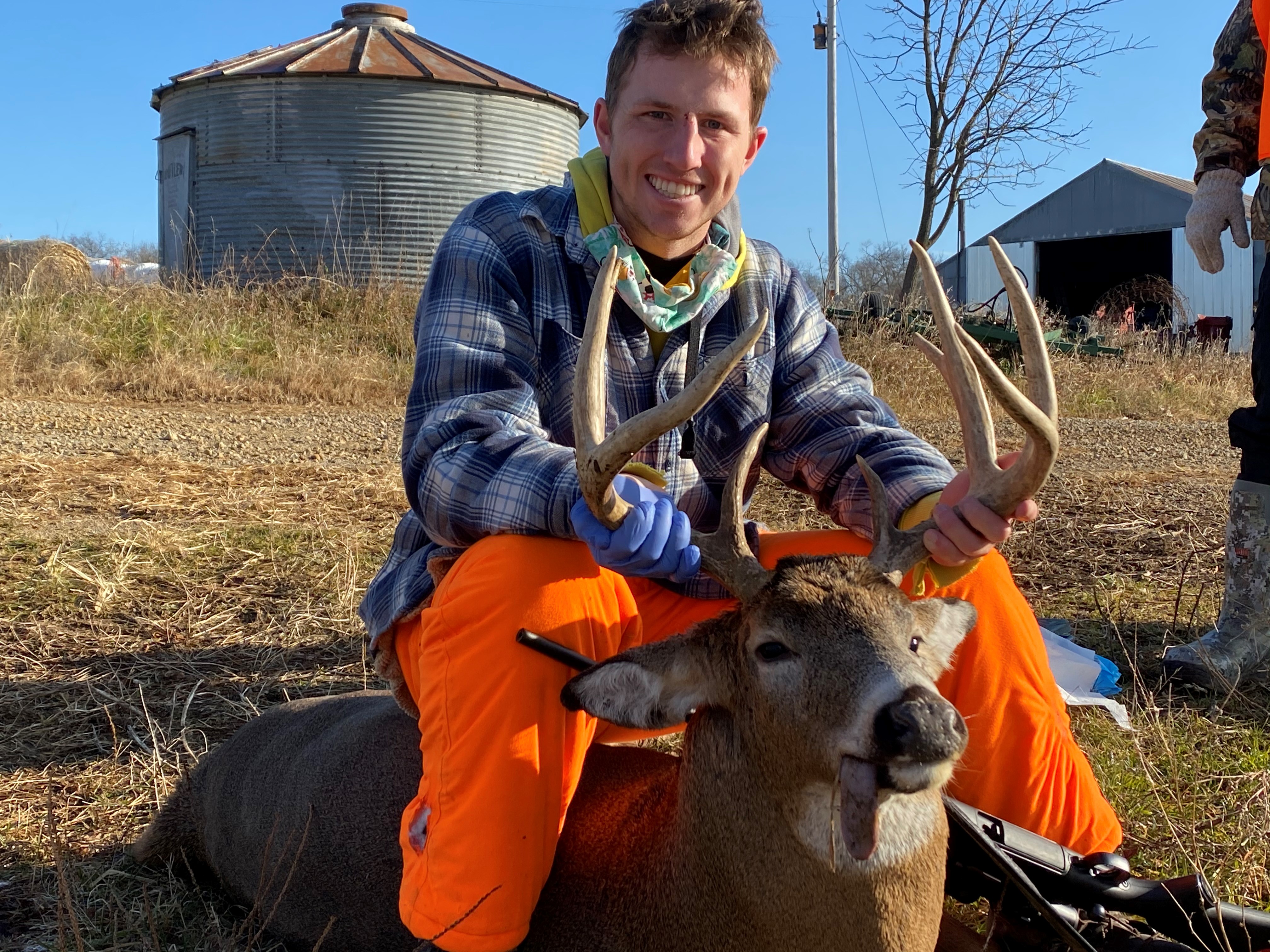 This is a photo of a me with a deer I shot.