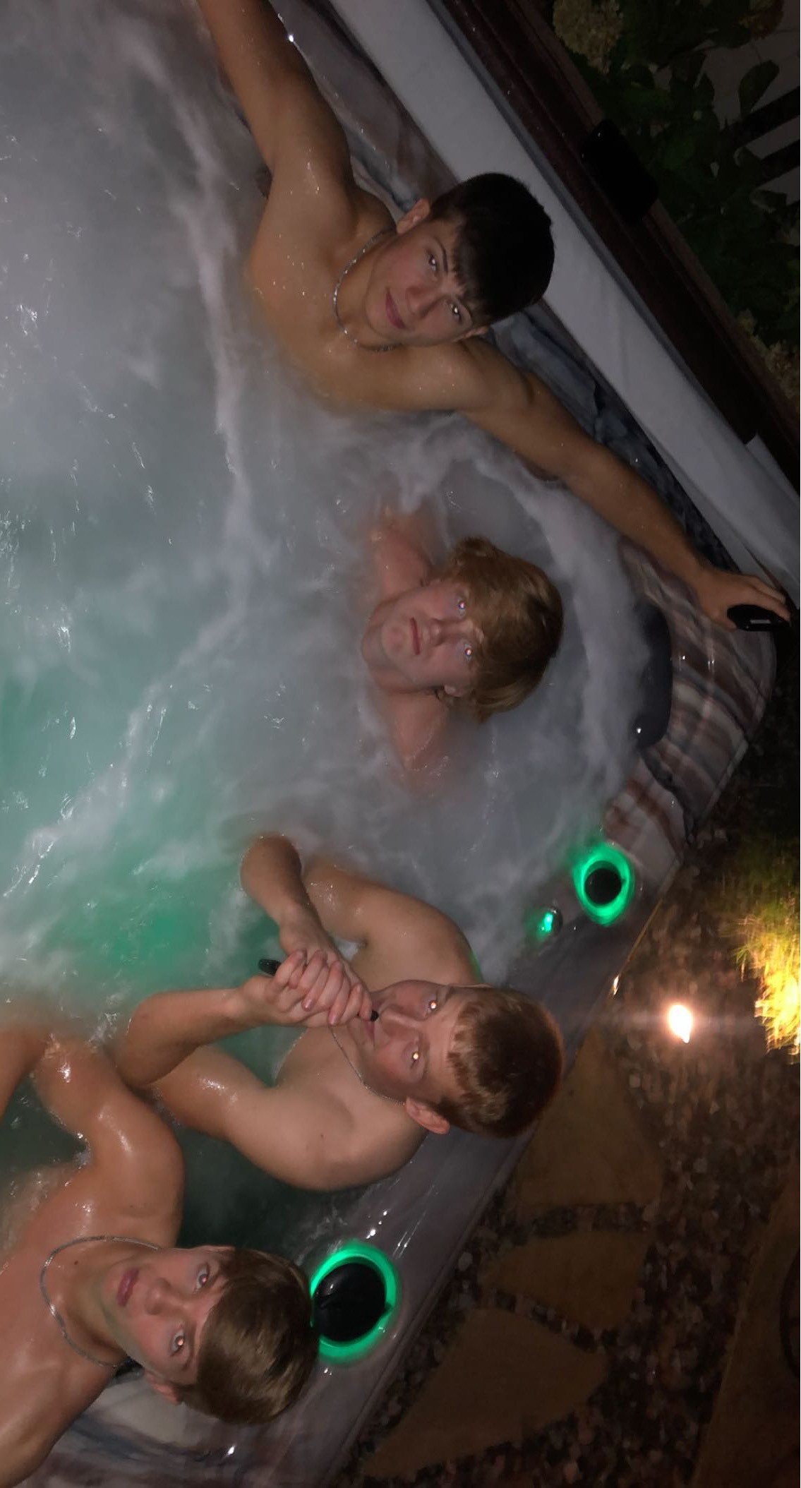 this is a photo of my friends and I hottubing
