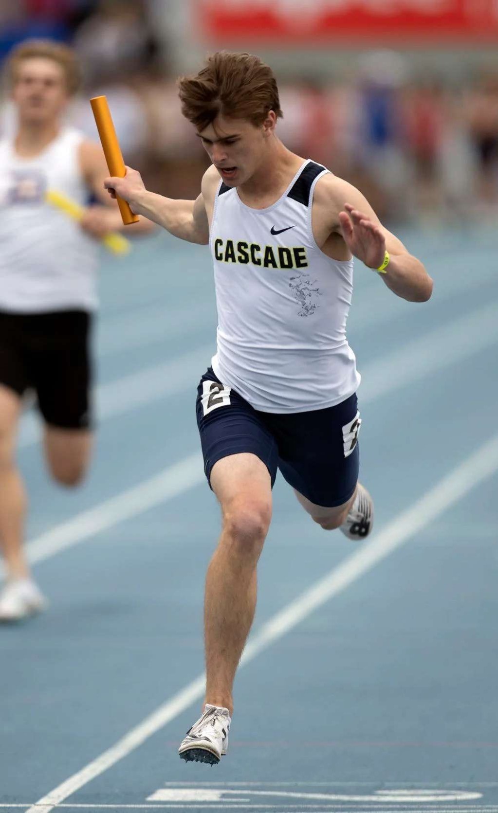 this is a photo of me running at the state track meet