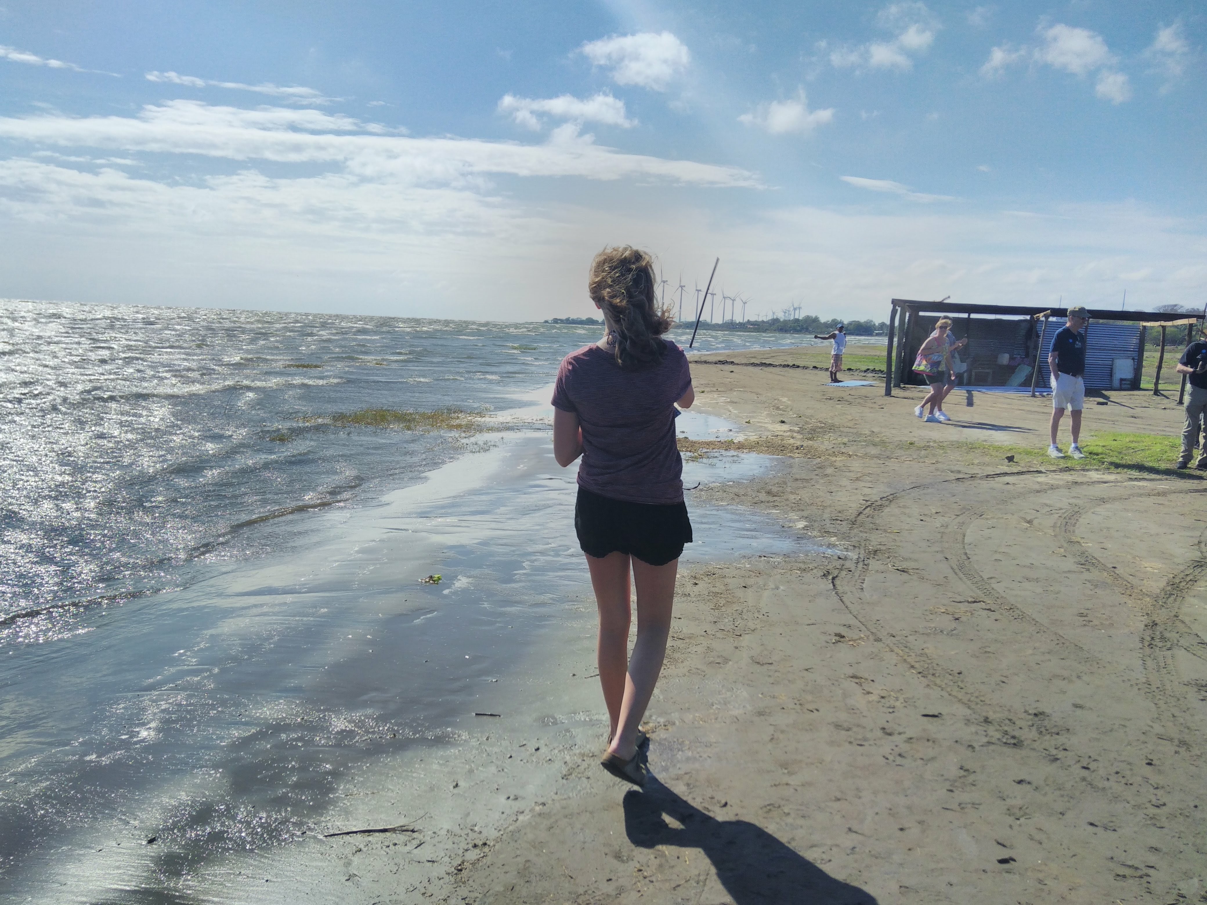 Gabi walking on beach