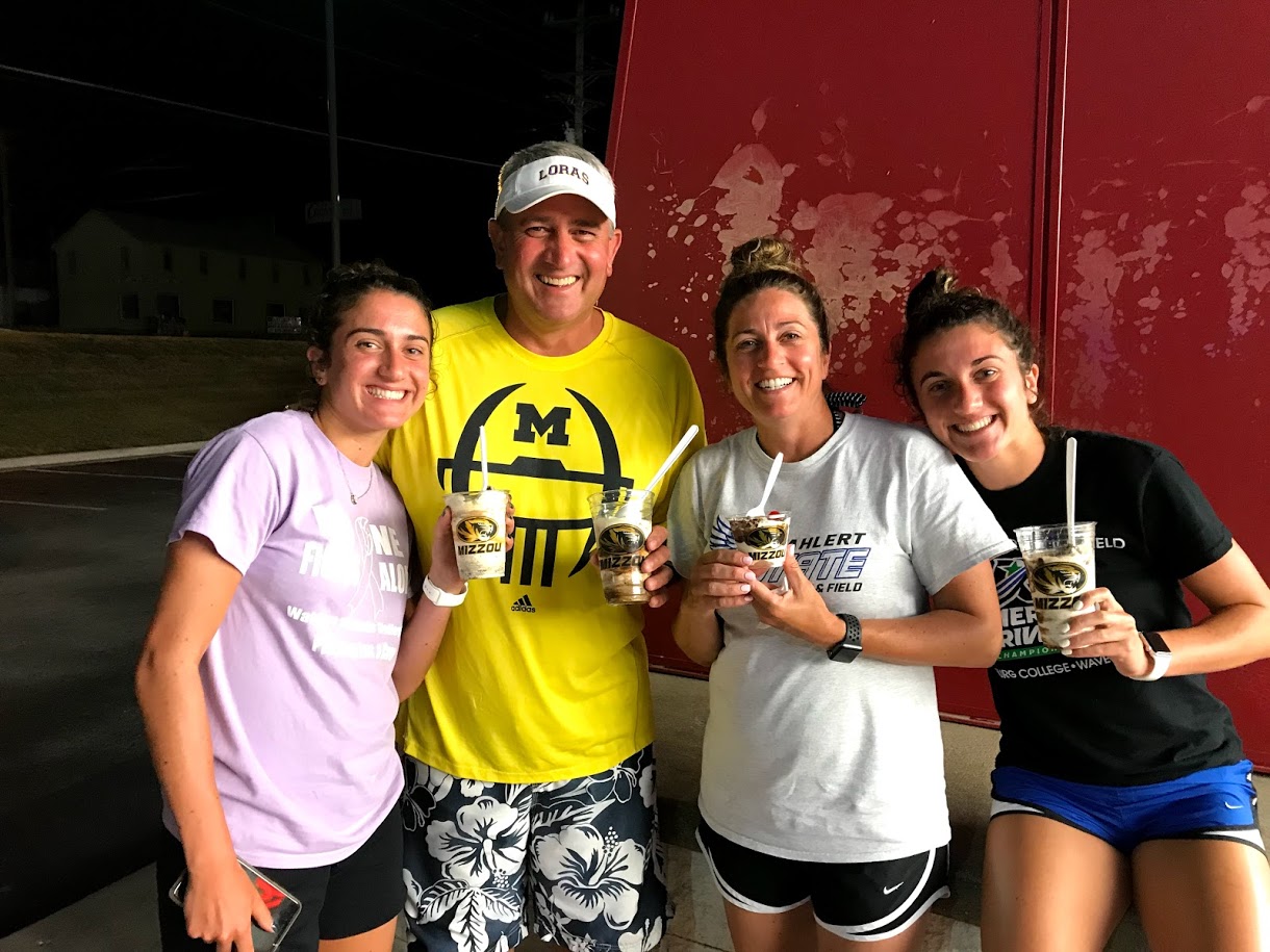 This is a picture of my family at an ice cream shop in Missouri. From left to right it's my sister, my dad, my mom, and me.