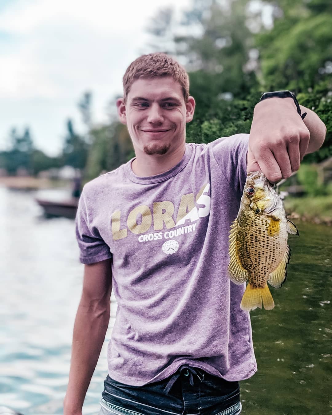 photo of Mike holding a fish