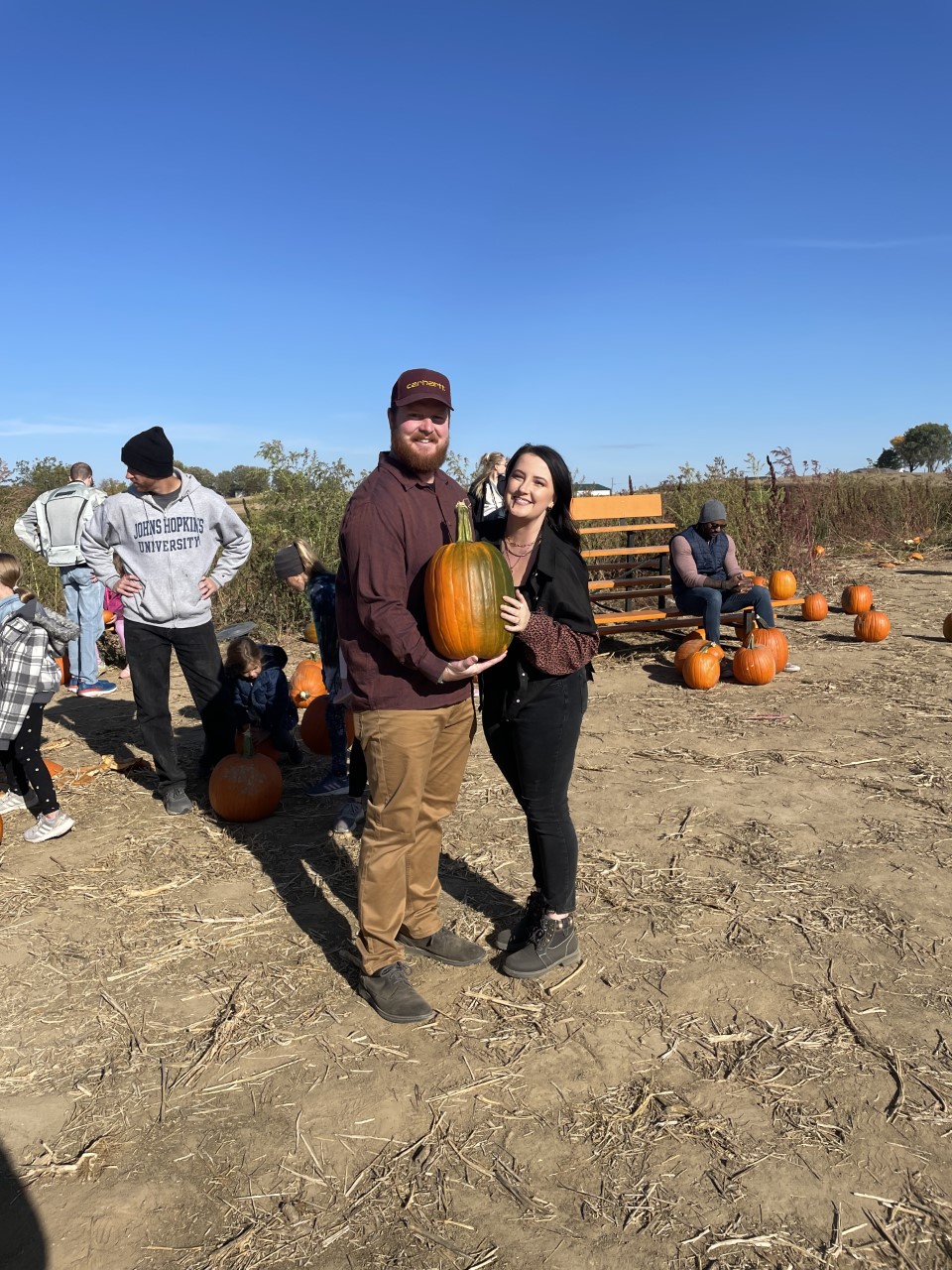 this is a photo of me and Adam at a pumpkin patch